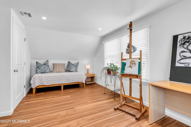 bedroom featuring lofted ceiling, light wood-style flooring, baseboards, recessed lighting, and a desk
