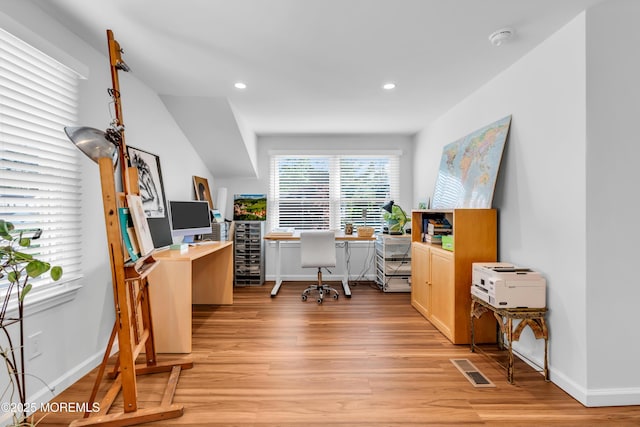 home office featuring light wood-style floors, baseboards, and recessed lighting