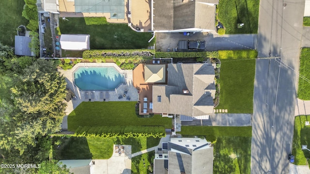 drone / aerial view of a pool area