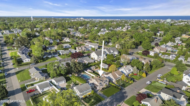 aerial view of property's location with nearby suburban area