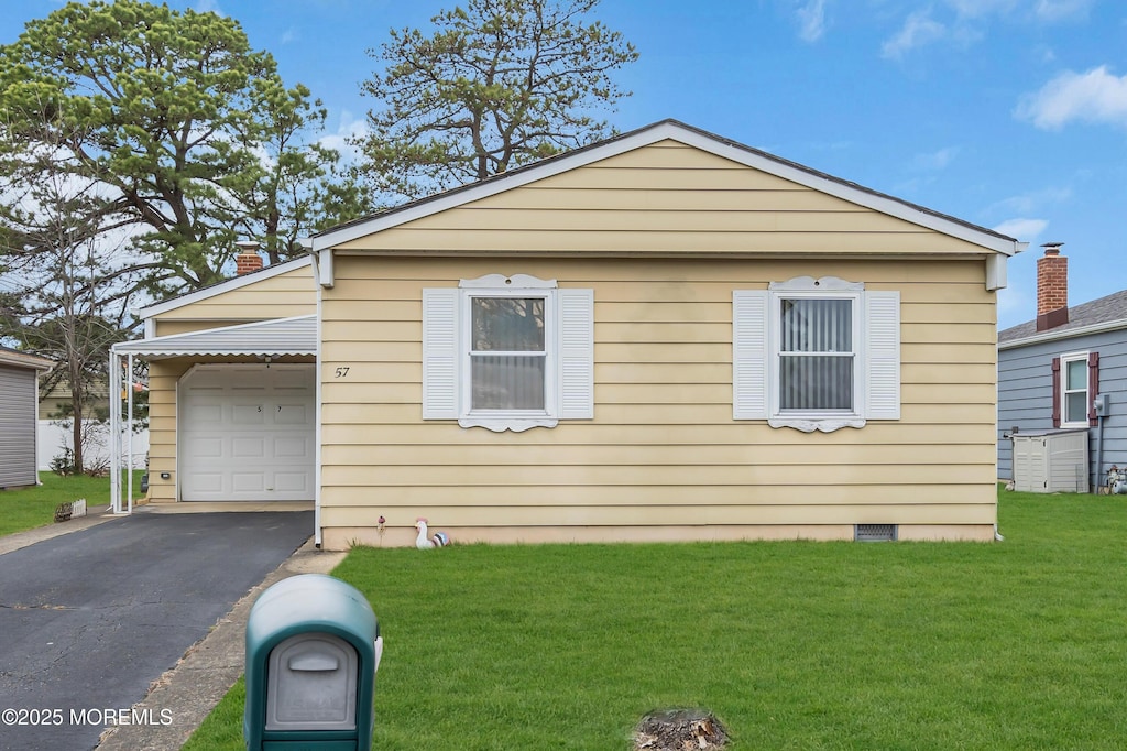 bungalow-style home featuring aphalt driveway, a front lawn, and crawl space