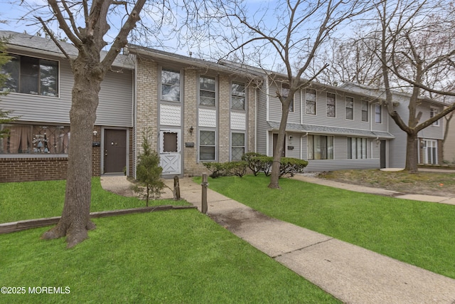 142 Coventry Dr, Lakewood, NJ 08701 - view of property with brick siding and a front lawn