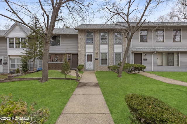 142 Coventry Dr, Lakewood, NJ 08701 - view of property featuring a front lawn and brick siding