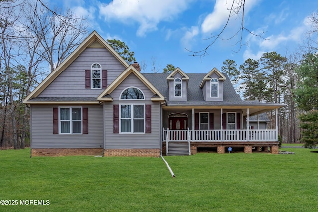 7208 1st Ave, Mays Landing, NJ 08330 - view of front facade featuring a chimney, a front lawn, a shingled roof, and covered porch