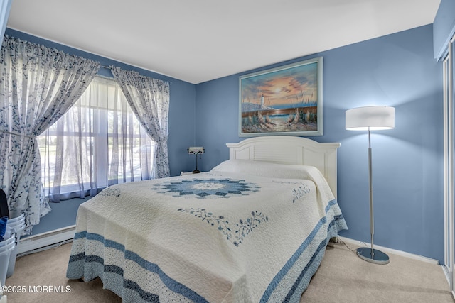 bedroom featuring baseboards, a baseboard radiator, and carpet flooring