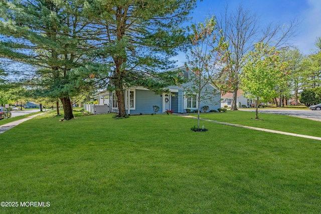 exterior space featuring a front lawn