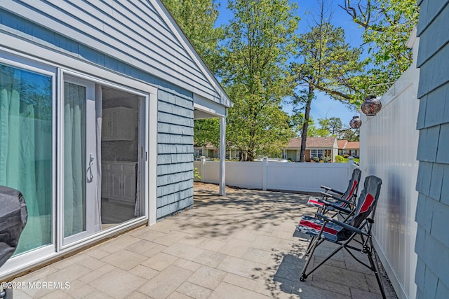 view of patio / terrace with fence