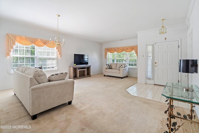 108 Belvedere Dr N, Manchester, NJ 08759 - tiled living room with carpet flooring, a notable chandelier, and crown molding