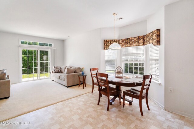 108 Belvedere Dr N, Manchester, NJ 08759 - dining room with light carpet, baseboards, and visible vents