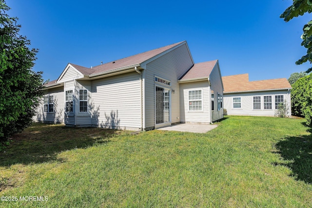 108 Belvedere Dr N, Manchester, NJ 08759 - rear view of house with a yard and a patio