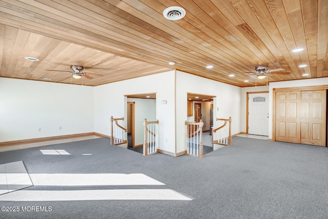 interior space with visible vents, carpet, ceiling fan, and wood ceiling