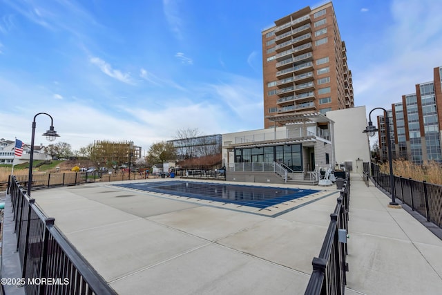 28 Riverside Ave Unit 1H, Red Bank, NJ 07701 - community pool featuring a patio and fence