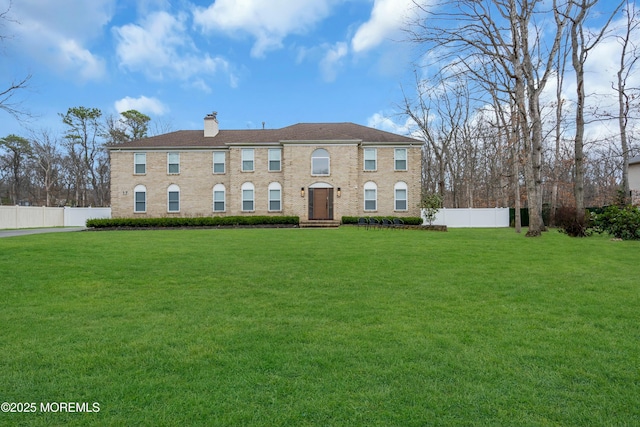 view of front of property with a chimney