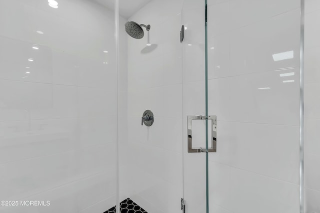 bathroom featuring a stall shower