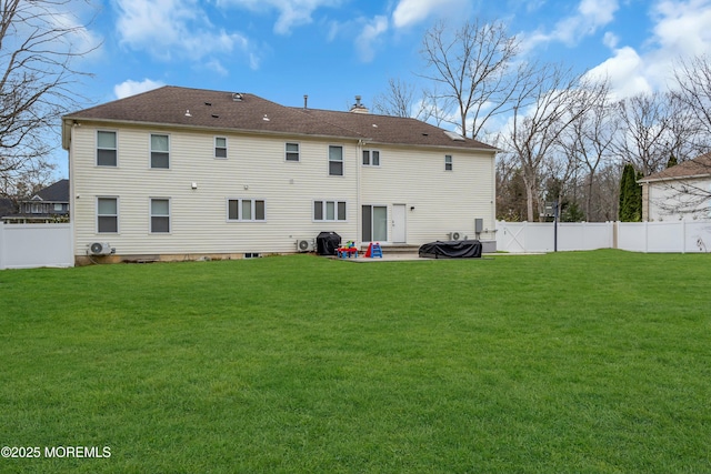 back of property featuring a patio area, a chimney, and a shingled roof