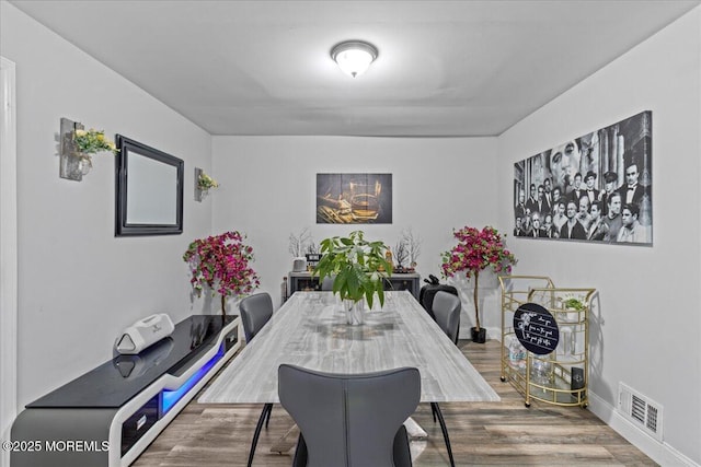 380 Evergreen Dr, Brick, NJ 08723 - dining room with baseboards, visible vents, and wood finished floors