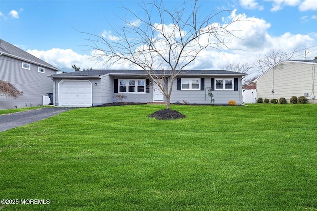380 Evergreen Dr, Brick, NJ 08723 - ranch-style home with driveway, an attached garage, and a front lawn