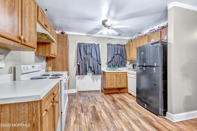 37D Cambridge Ct Unit 100D, Lakewood, NJ 08701 - kitchen with white appliances, under cabinet range hood, light countertops, ceiling fan, and ornamental molding