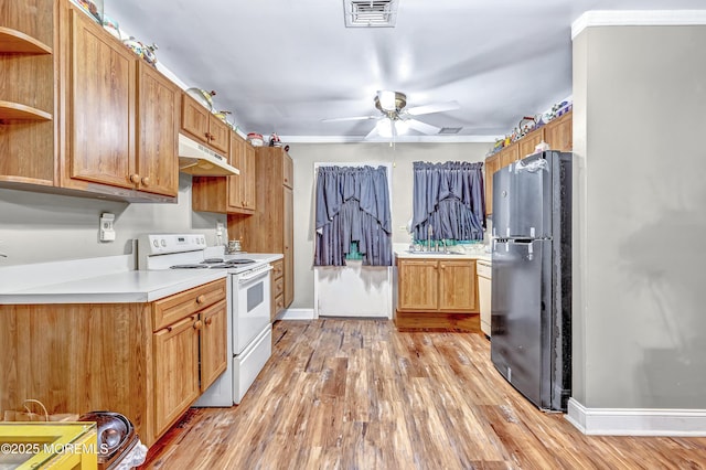 37D Cambridge Ct Unit 100D, Lakewood, NJ 08701 - kitchen featuring electric stove, freestanding refrigerator, under cabinet range hood, open shelves, and light wood-type flooring