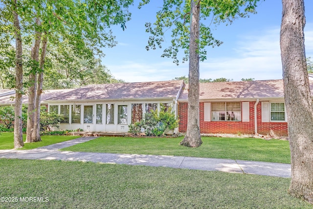 37D Cambridge Ct Unit 100D, Lakewood, NJ 08701 - ranch-style home with brick siding, a front yard, and a shingled roof