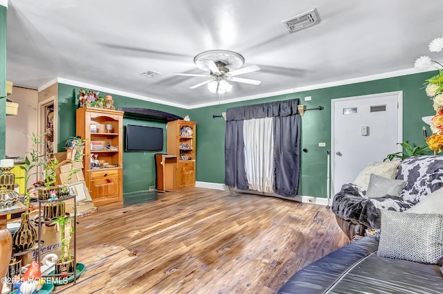 37D Cambridge Ct Unit 100D, Lakewood, NJ 08701 - living room with ceiling fan, light wood-style floors, and crown molding