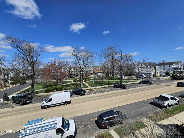 view of street featuring sidewalks and a residential view