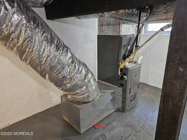 interior space featuring unfinished concrete flooring