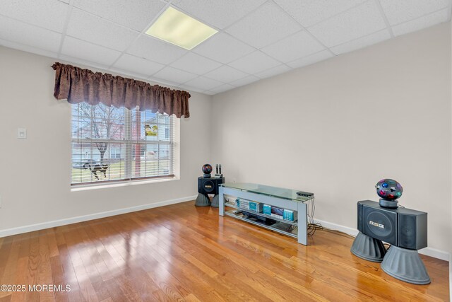 1 Kushnetki Rd, Parlin, NJ 08859 - miscellaneous room with a drop ceiling, baseboards, and wood finished floors