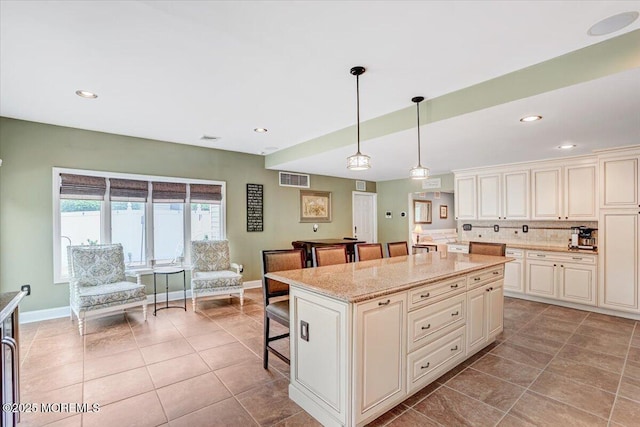 77 Warren Dr, Aberdeen, NJ 07747 - kitchen with light tile patterned flooring, decorative backsplash, a center island, baseboards, and recessed lighting