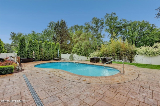 77 Warren Dr, Aberdeen, NJ 07747 - view of pool featuring a patio area, a fenced backyard, and an outdoor hangout area