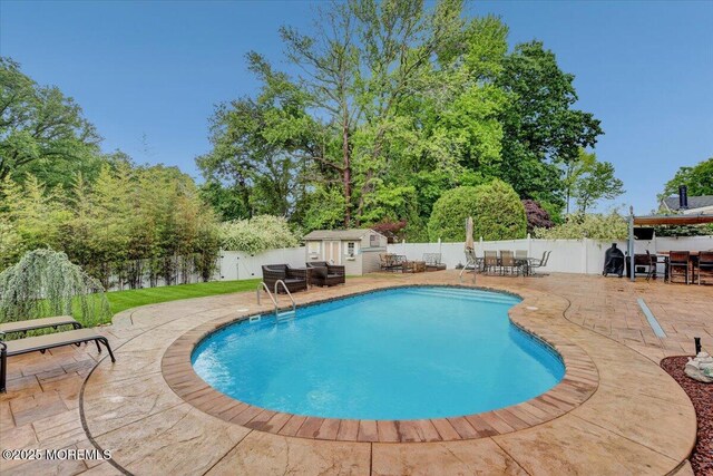 77 Warren Dr, Aberdeen, NJ 07747 - view of swimming pool with outdoor dining space, a fenced backyard, and a patio area