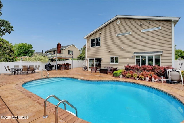 77 Warren Dr, Aberdeen, NJ 07747 - view of pool with an outdoor hangout area, a patio, a fenced backyard, and outdoor dining area