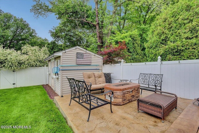77 Warren Dr, Aberdeen, NJ 07747 - view of patio / terrace featuring an outbuilding, an outdoor living space with a fire pit, and view of scattered trees