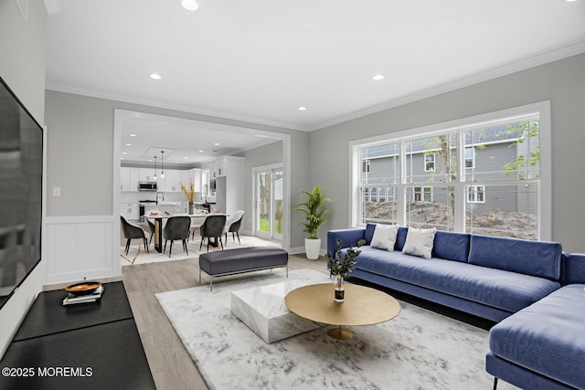 2117 Broadway Blvd, Toms River, NJ 08757 - living room with light wood-type flooring, recessed lighting, and crown molding