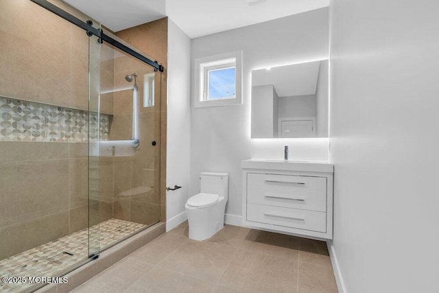 full bathroom with a shower stall, tile patterned floors, baseboards, and toilet