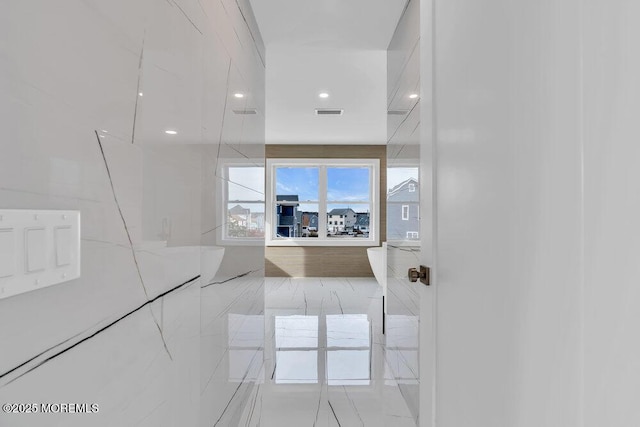 interior space featuring visible vents and recessed lighting