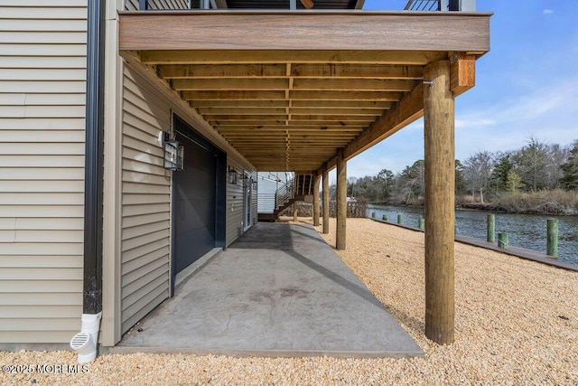 view of patio / terrace featuring a water view