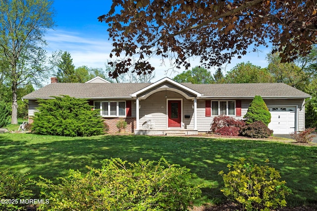 ranch-style house featuring an attached garage, a front yard, and a chimney