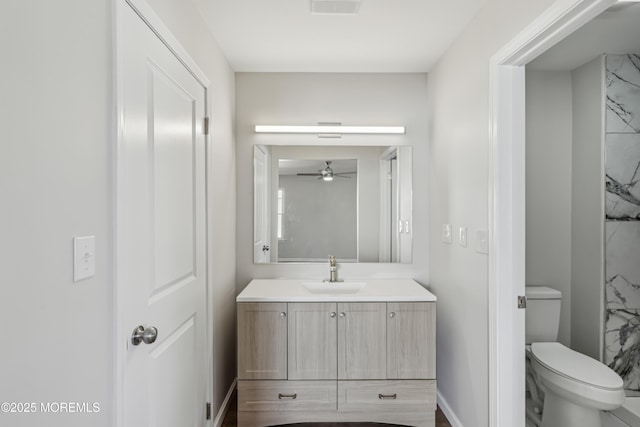 9 Weybridge Pl, Manchester, NJ 08759 - full bath featuring toilet, vanity, ceiling fan, and baseboards