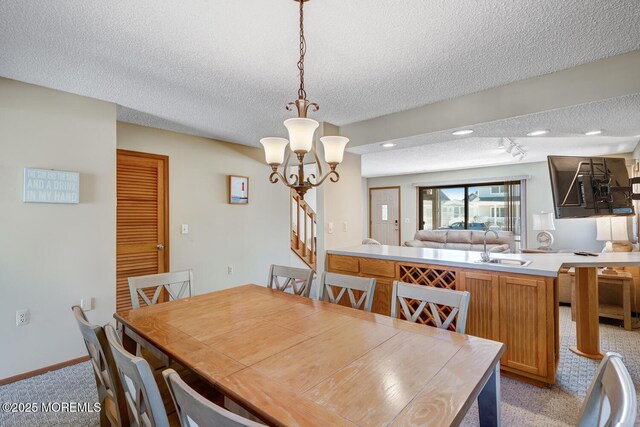 21 Brown Ave Unit 1, Lavallette, NJ 08735 - dining area with a textured ceiling, light colored carpet, recessed lighting, a chandelier, and baseboards