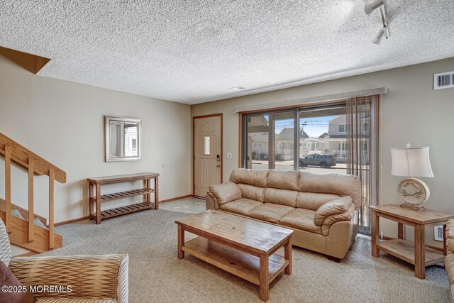21 Brown Ave Unit 1, Lavallette, NJ 08735 - living area with visible vents, a wealth of natural light, light carpet, and baseboards