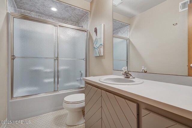 21 Brown Ave Unit 1, Lavallette, NJ 08735 - bathroom with visible vents, toilet, vanity, and bath / shower combo with glass door