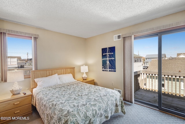 21 Brown Ave Unit 1, Lavallette, NJ 08735 - bedroom with access to exterior, carpet flooring, multiple windows, and visible vents