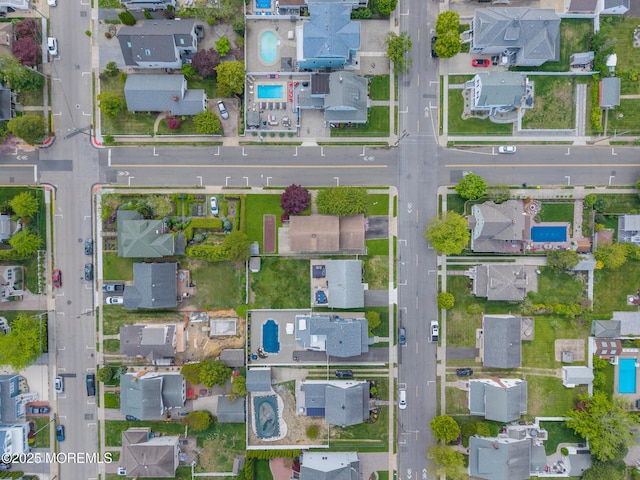 aerial view of property's location featuring nearby suburban area