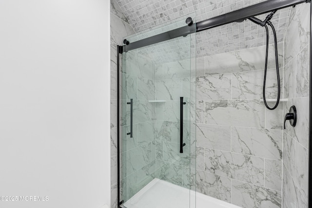 full bathroom with a shower stall