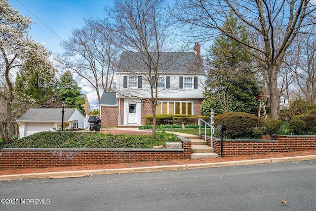 42 Pershing Ave, Sayreville Boro, NJ 08872 - colonial house with a chimney and brick siding