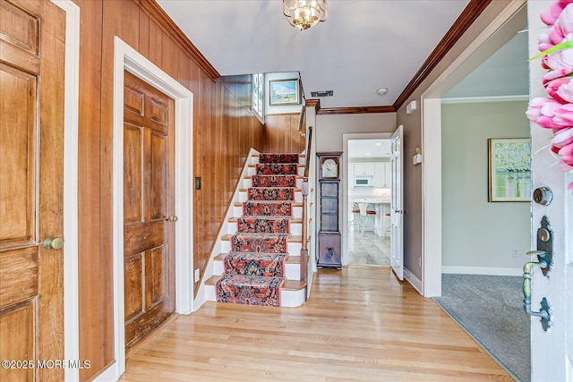 42 Pershing Ave, Sayreville Boro, NJ 08872 - foyer with stairs, ornamental molding, and light wood-style floors