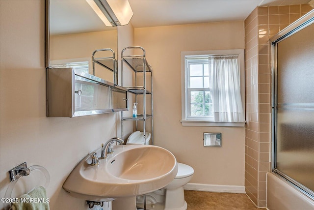 42 Pershing Ave, Sayreville Boro, NJ 08872 - full bathroom featuring toilet and combined bath / shower with glass door
