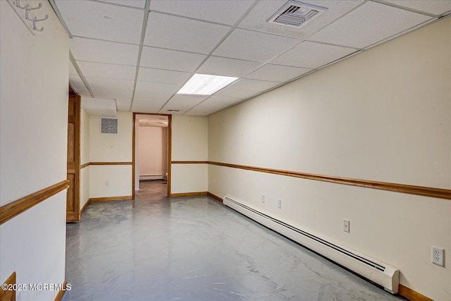 42 Pershing Ave, Sayreville Boro, NJ 08872 - spare room with baseboard heating, concrete flooring, a baseboard radiator, and a drop ceiling