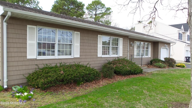 exterior space with a front yard and a chimney